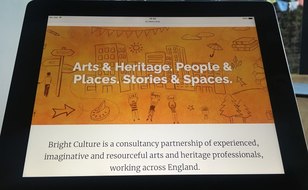 An ipad screen with the Bright Culture website displaying on it.